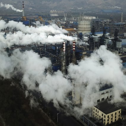 Smoke and steam rising from a coal processing plant in Hejin in central China's Shanxi province in 2019. Photo: AP