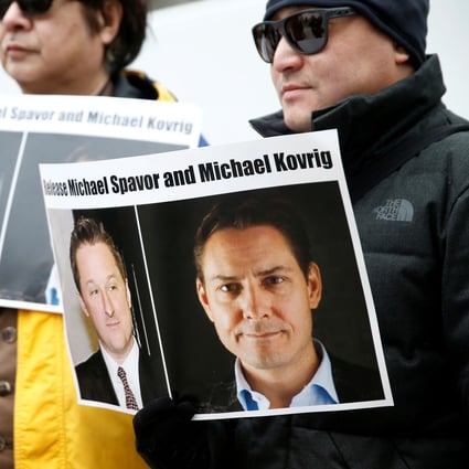 Supporters hold signs calling for China to release Canadian detainees Michael Spavor and Michael Kovrig in Vancouver in March 2019. The pair have just had virtual access to Canada’s ambassador. Photo: Reuters