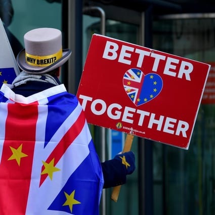 An anti-Brexit protester demonstrates outside the conference centre where the trade deal negotiations are taking place in London on November 9. Photo: Reuters