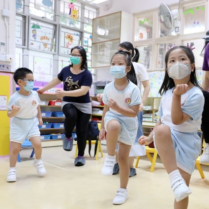 Children exercise at Hong Kong Chinese Women’s Club Kindergarten in Shau Kei Wan on their first day back in school on June 15. Photo: Nora Tam