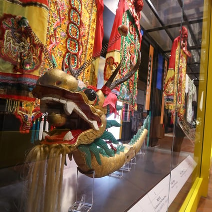Visitors look at a dragon head for the Tai O dragon boat parade at the Intangible Cultural Heritage Centre in Sam Tung Uk Museum in Tsuen Wan in July 2016. Chinese culture is alive and well in Hong Kong. Photo: Dickson Lee