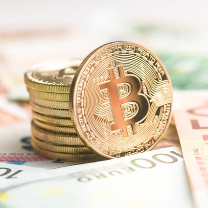 The golden bitcoin. Cryptocurrency and euro currency. Photo: Shutterstock