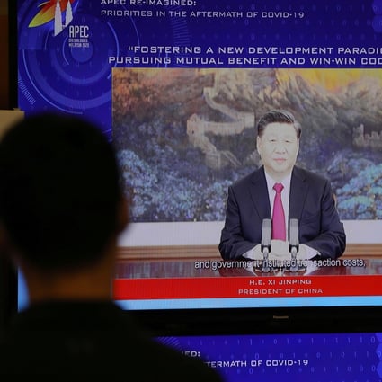 A video screen shows Chinese President Xi Jinping speaking to fellow Apec members. Photo: Reuters