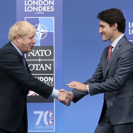 British Prime Minister Boris Johnson, left, and Canadian Prime Minister Justin Trudeau at The Grove hotel and resort in Watford, Hertfordshire, England. Photo: AP