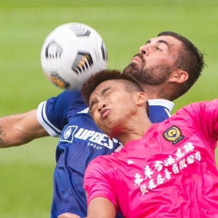 Eastern’s Lucas wins the ball under pressure from a Resources Capital defender in the Hong Kong Premier League 2020-21 season opener. Photo: HKFA