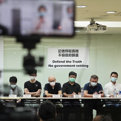 Representatives of Hong Kong media organisations attend a press conference on September 24, protesting against new rules restricting who can provide press coverage during demonstrations. Photo: AP