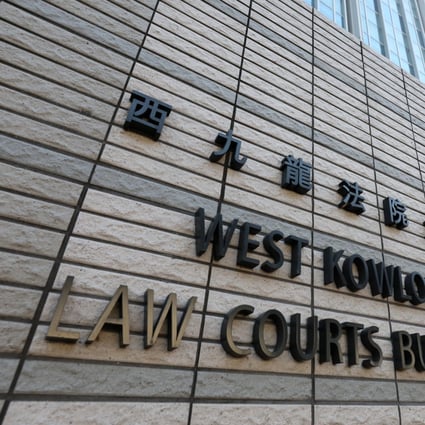 The first defendant to be charged under the national security law over independence chants was refused bail when he appeared at West Kowloon Court. Photo: Felix Wong