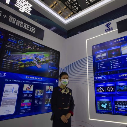 A woman stands in the China Telecom booth at the 7th World Internet Conference on 23 November 2020. Photo: EPA-EFE