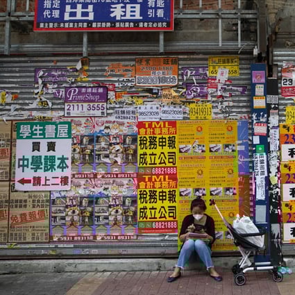 Closed shops in Hong Kong’s Mong Kok district. Many companies that have recently decided to offload assets have been forced to sell at losses. Photo: Winson Wong