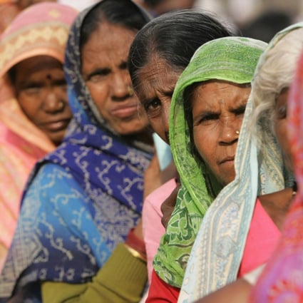 Lower-caste Dalit women wait for medical treatment in Mumbai in this 2006 file photo. Photo: AFP