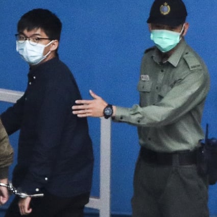 Joshua Wong arrives at the Lai Chi Kok Reception Centre on Monday. Photo: Winson Wong