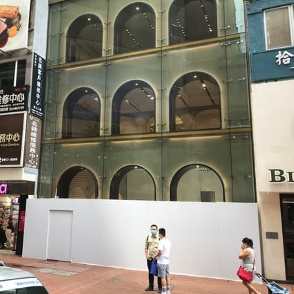 The La Perla store on Russell Street in Causeway Bay in Hong Kong closed earlier this year amid protests and Covid-19 restrictions, leaving an empty shopfront and little festive cheer.