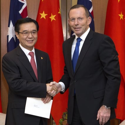 Then China Commerce Minister Gao Hucheng and then Australian Prime Minister Tony Abbott formalised the China-Australia Free Trade Agreement (ChAfta) in June 2015. Photo: Getty Images