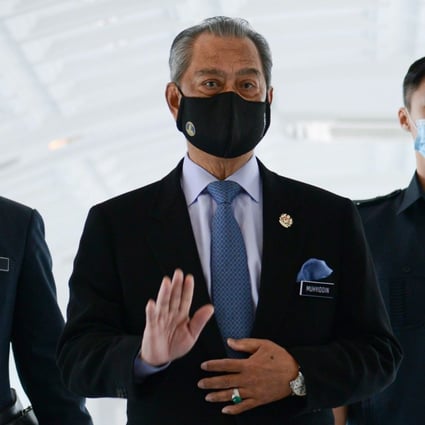 PM Muhyiddin Yassin arrives for a session at the Malaysian Parliament in Kuala Lumpur on November 26, 2020. Photo: AFP