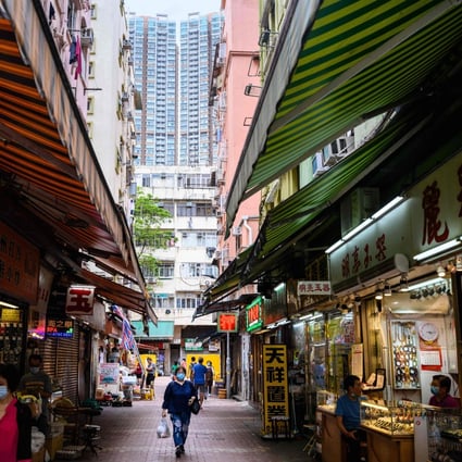 New and old residential buildings, many of the latter housing cramped cubicle and sub-divided flats, in the New Territories of Hong Kong. Photo: AFP