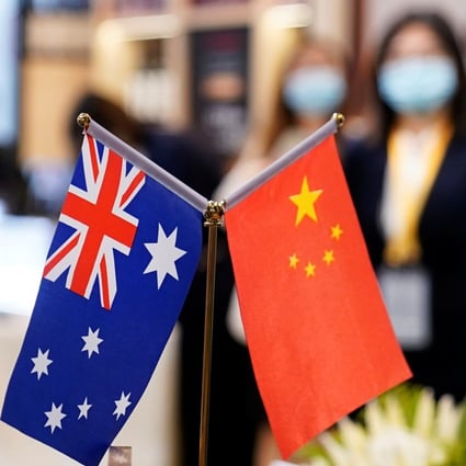 Australian and Chinese flags are seen at the third China International Import Expo, in Shanghai on November 6. Photo: Reuters