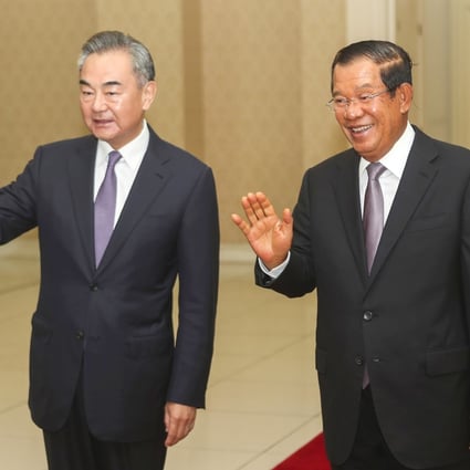 Chinese Foreign Minister Wang Yi, left, with Cambodian Prime Minister Hun Sen before their meeting in Phnom Penh in October, when the two countries signed a free-trade agreement. Photo: AP