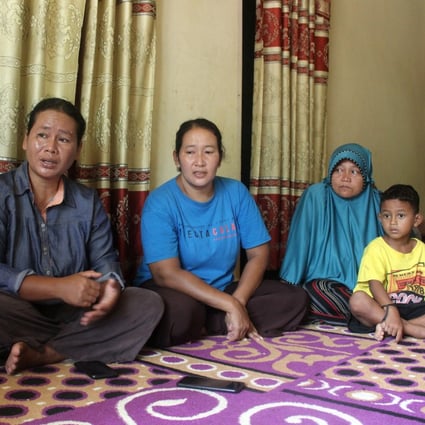 The mothers of the three children who went missing from Naman Jahe village in Indonesia. They say they believe their children are still alive and are trying to stay positive. Photo: Tonggo Simangunsong
