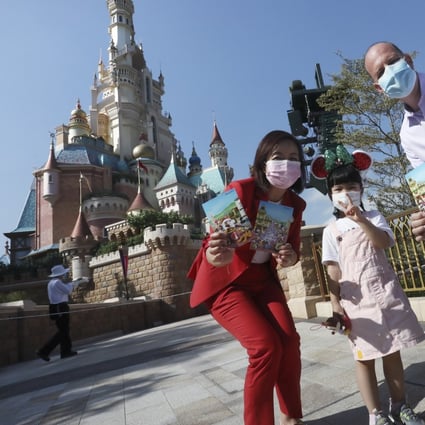 Disney’s vice-president, communications and public affairs Anita Lai (left) and senior vice-president, operations Tim Sypko (right) with 4-year-old Jessica Wong from J Life Foundation. Photo: Jonathan Wong