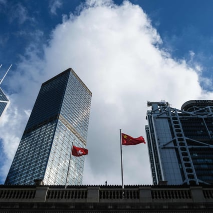 The Chinese national flag and the Hong Kong flag fly outside the Court of Final Appeal in Hong Kong in July. Beijing’s call for judicial reform has clarified that the finality in the “power of final adjudication” of Hong Kong as vested in the Court of Final Appeal had been misunderstood. Photo: AFP