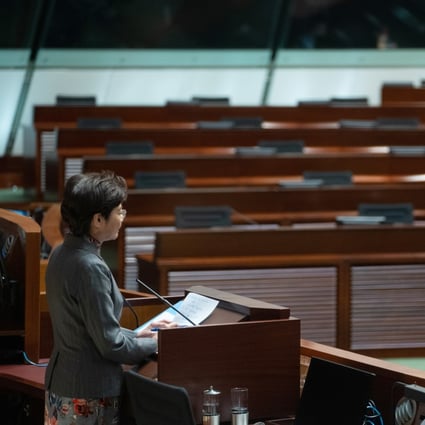 Empty seats during an address by Carrie Lam after the mass resignation of opposition lawmakers. Photo: Bloomberg