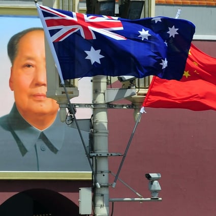 The Australian and Chinese flags in Tiananmen Square, Beijing. Photo: AFP