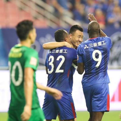 Fans of ‘China derby’ rivals Shanghai Shenhua and Beijing Guoan are among those calling on the Chinese Football Association to drop the new neutral name rule. Photo: Xinhua