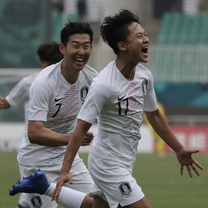 South Korea’s Lee Seung-woo celebrates his goal with Son Heung-min after scoring against Vietnam in the semi-finals at the 2018 Asian Games. Photo: AP