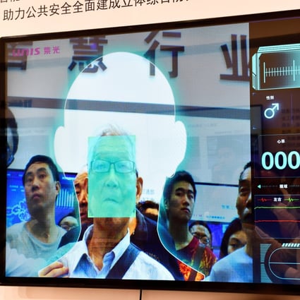 A facial recognition system developed by Tsinghua Unigroup at the first Smart China Expo in Chongqing on August 23, 2018. Unigroup defaulted on a US$450 million keepwell-backed bond. Photo: Reuters