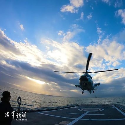 An armed helicopter lands on a deck in a PLA live-fire exercise in the South China Sea last month. Photo: PLA Navy