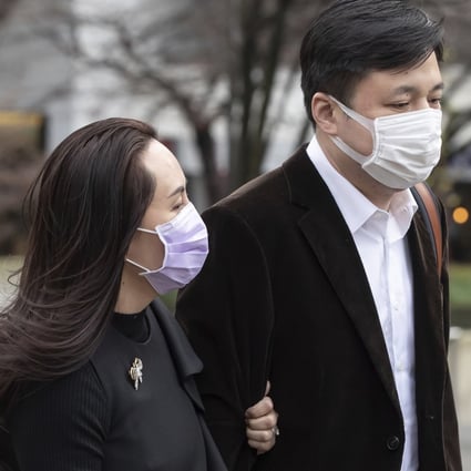 Meng Wanzhou, chief financial officer of Huawei, returns to BC Supreme Court with her husband, Liu Xiaozong, after a break from her hearing on Wednesday. Photo: The Canadian Press via AP