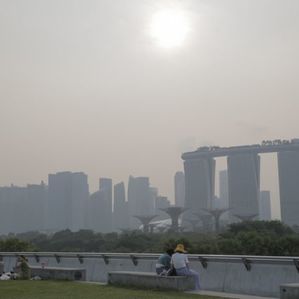Singapore’s financial district seen through a haze of pollution in September 2019. A private sector-led coalition in Singapore is hoping to create a region-wide market ecosystem for voluntary carbon credits. Photo: EPA-EFE
