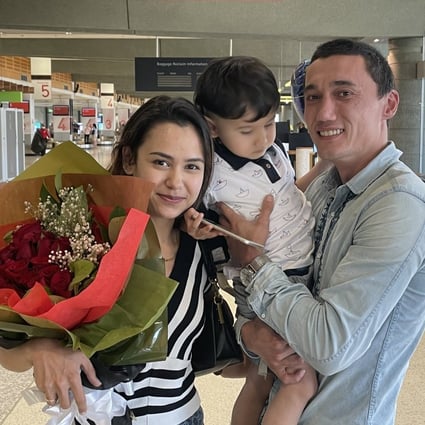 Sadam Abudusalamu pictured with his wife Nadila Wumaier and three-year-old son Lufty at Sydney airport in Australia. Photo: Twitter