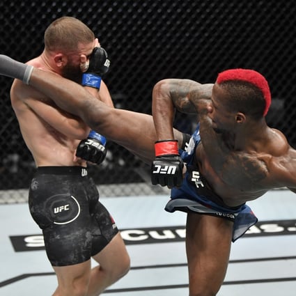 Rafael Fiziev defends himself from a kick by DR Congo’s Marc Diakiese in their lightweight bout during UFC Fight Night in Abu Dhabi. Photo: Jeff Bottari/Zuffa LLC