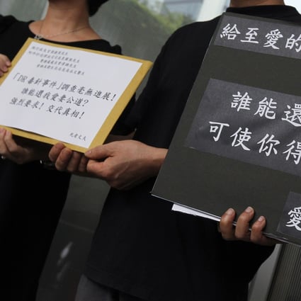 Family members of a woman who died after undergoing a procedure at DR Group’s Hong Kong Mesotherapy Centre protest outside the Legislative Council, urging the government to conduct a thorough investigation, in October 2013. Photo: K.Y. Cheng