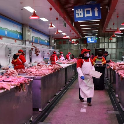 China’s official consumer price index fell to minus 0.5 per cent in November from a year earlier, driven by improvements in pork supply. Photo: Reuters