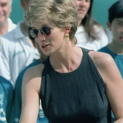 Princess Diana shakes hands with Michael Chang after his victory in the Salem Hong Kong Open tennis tournament at Victoria Park, Tin Hau, in April, 1995. She is wearing a pair of gold earrings from jewellers K.S. Sze and Sons, which she bought on her previous visit to Hong Kong in 1989. Photo: SCMP