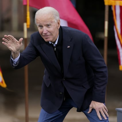US President-elect Joe Biden waves to supporters after speaking at a drive-in rally in Atlanta for Georgia Democratic Senate candidates Raphael Warnock and Jon Ossoff. Photo: AP