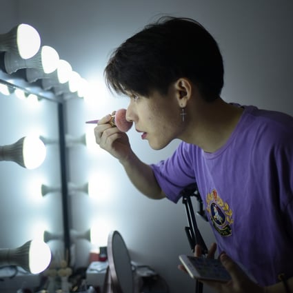 Jiang Cheng from Beijing prepares for a live video broadcast. He is among hundreds of Chinese men sharing beauty tips online and earning money as the skincare business booms. Photo: AFP
