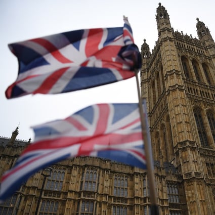 Union flags fly before the Houses of Parliament in London. A British all-party parliamentary group has been championing the rights of Hongkongers involved in last year’s anti-government protests. Photo: EPA-EFE