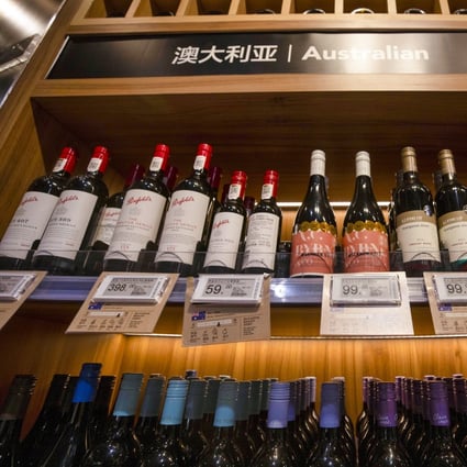 Australian wine seen on a shop shelf in Shanghai on December 8. China imposed a fresh round of import duties on Australian wine starting December 11, after slapping anti-dumping tariffs of up to 212 per cent in late November, amid tensions since Canberra earlier this year called for an inquiry into the origin of the Covid-19 pandemic. Photo: EPA-EFE