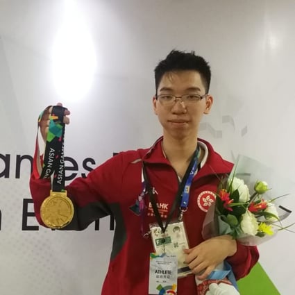 Lo Tsz-kin, also known as Kin0531, shows off his gold medal at the 2018 Jakarta Asian Games, when esports enjoyed exhibition status. Photo: HKSF&OC