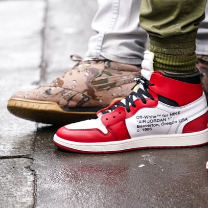 A guest wears Off-White for Nike Air Jordan 1 trainers during Paris Fashion Week in March 2020. Photo: Getty Images