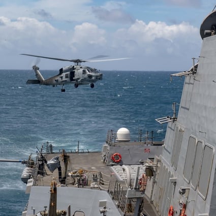 This file photo shows a helicopter taking off from the USS Mustin, which Beijing says disrupted stability by transiting through the Taiwan Strait on Saturday. Photo: US Navy