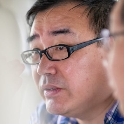 Yang Hengjun, a prominent author and academic who is now an Australian citizen, will now go on trial on espionage charges in April 2021. Photo: Reuters