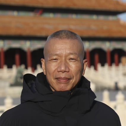 Chinese artist Cai Guoqiang outside the Palace Museum in Beijing, China, where his new show, “Odyssey and Homecoming”, is being held. Photo: Simon Song
