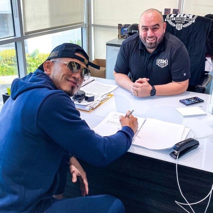 Anthony Pettis signs his new PFL contract. Photo: Instagram