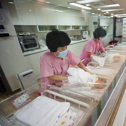 Nurses taking care of newborns at a birthing care centre in Seoul. Photo: SCMP