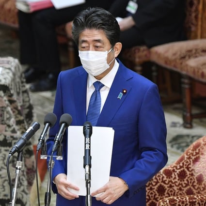 Former prime minister Shinzo Abe speaks during a House of Representatives committee session in Tokyo on Thursday about allegations his camp illegally paid for dinner receptions attended by his supporters. Photo: Kyodo