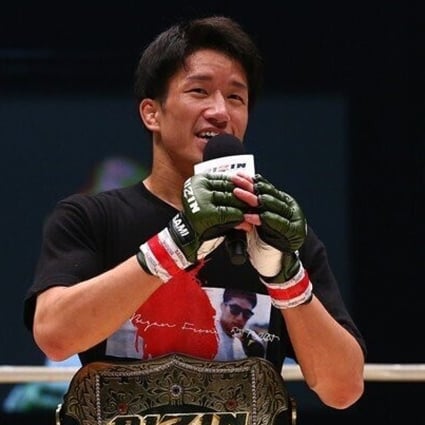Kai Asakura celebrates winning the vacant bantamweight title. Photo: Rizin FF